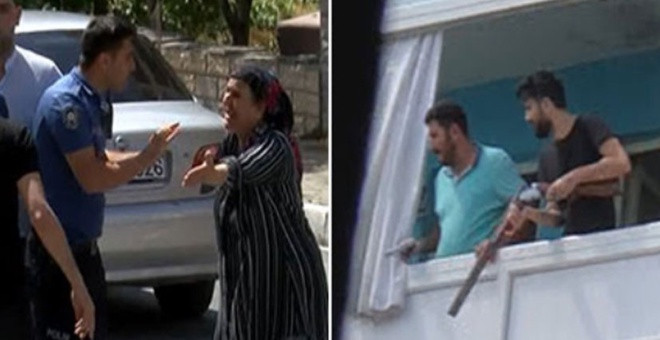 Evləri sökülməsin deyə əllərinə silah alıb, balkona çıxdılar - FOTO (VİDEO)