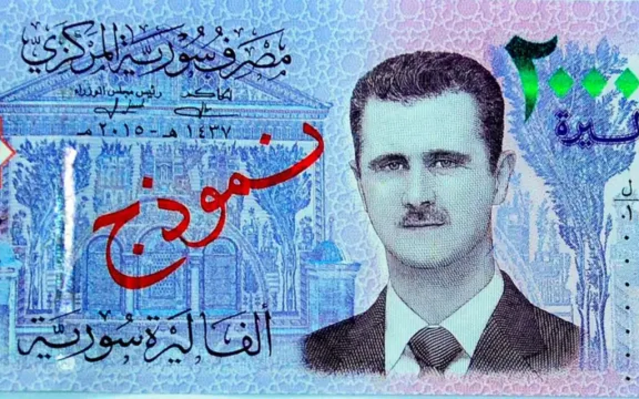 Suriya Əsədin portretlərini əskinaslardan çıxardı -FOTO