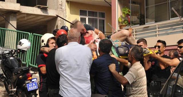Usta yeni tikilən binadan yıxıldı:  Armatur arxasından girib, başından çıxdı (FOTOLAR)