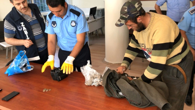 Dilənçinin üzərindən 300 minə yaxın qəpik pul çıxdı -  FOTO-VİDEO